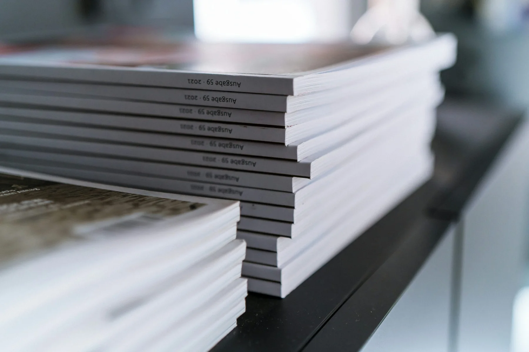 Neatly stacked printed publications